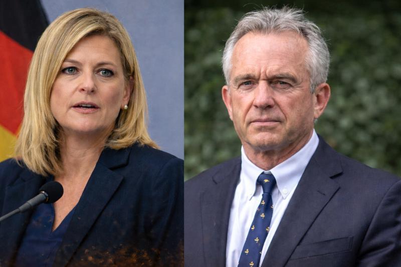 Porträtfoto von Nina Warken bei einer Pressekonferenz neben einem Porträt von Robert F. Kennedy Jr., beide in formeller Kleidung vor neutralem Hintergrund.