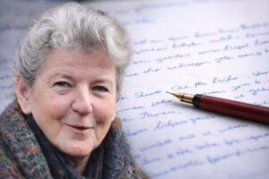 Porträt von Dr. Bianca Witzschel vor handschriftlichem Brief – Artikelbild zur juristischen Auseinandersetzung.