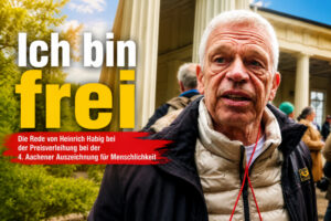 Politische Verfolgung in Deutschland 14 Heinrich Habig bei der Aachener Auszeichnung für Menschlichkeit mit dem Schriftzug „Ich bin frei“