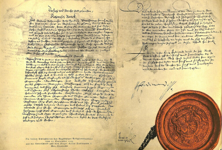 Politische Verfolgung in Deutschland 49 Detail der Vertragsurkunde über den Augsburger Religionsfrieden mit der Unterschrift und dem Siegel Kaiser Ferdinands I.